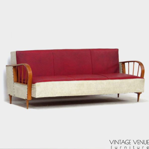 Vintage retro sofa fold-out sofa bed in skai leather from the 1950s '60s, with beautiful round curved wooden armrests