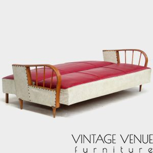 Vintage retro sofa fold-out sofa bed in skai leather from the 1950s '60s, with beautiful round curved wooden armrests