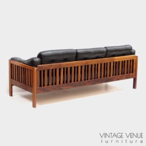 Vintage mid century modern high quality black leather sofa, model "Monte Carlo" made of solid rosewood designed by Ingvar Stockum for Futura Möbler in the 1960s Vintage retro design sofa in black leather with solid rosewood frame from the 1960s