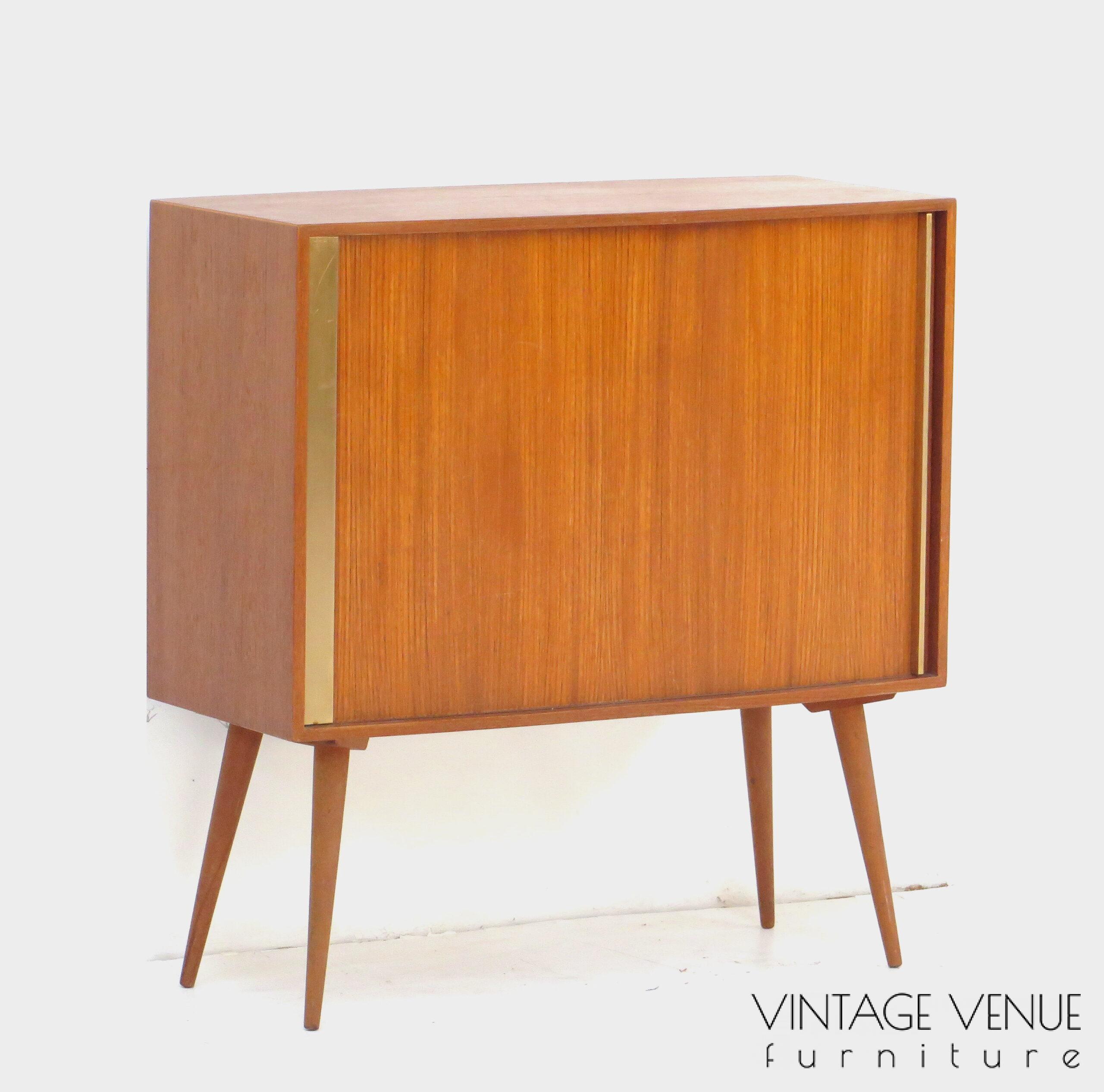 Vintage mid century modern small bookcase cabinet made of teak, 1960s / Vintage retro teak cabinet / sideboard cabinet / dresser cabinet / with roller door and sloping legs, 1950s '60s