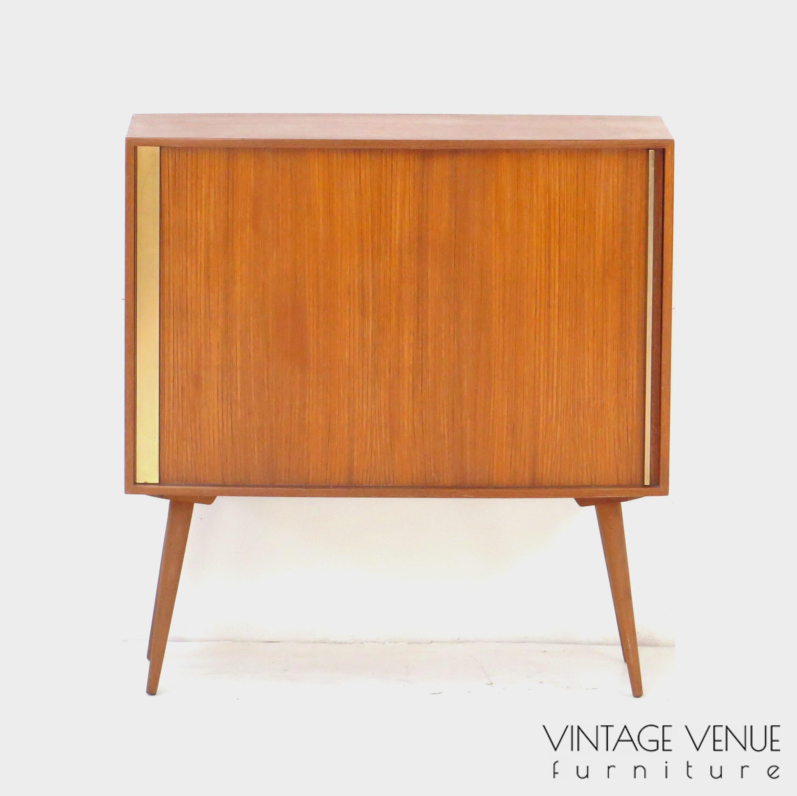 Vintage mid century modern small bookcase cabinet made of teak, 1960s / Vintage retro teak cabinet / sideboard cabinet / dresser cabinet / with roller door and sloping legs, 1950s '60s Vintage mid century modern small bookcase cabinet made of teak, 1960s / Vintage retro teak cabinet / sideboard cabinet / dresser cabinet / with roller door and sloping legs, 1950s '60s