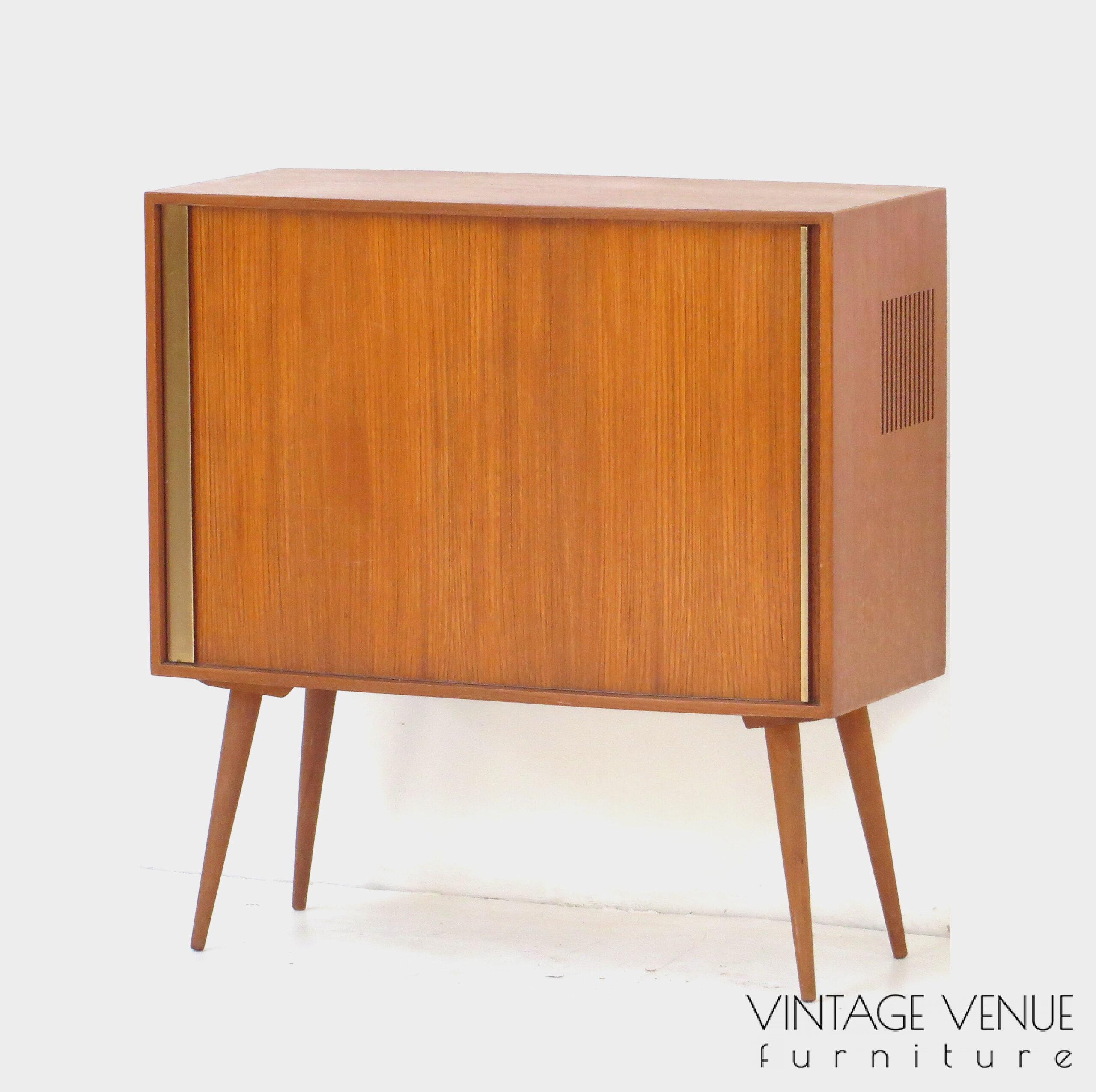 Vintage mid century modern small bookcase cabinet made of teak, 1960s / Vintage retro teak cabinet / sideboard cabinet / dresser cabinet / with roller door and sloping legs, 1950s '60s Vintage mid century modern small bookcase cabinet made of teak, 1960s / Vintage retro teak cabinet / sideboard cabinet / dresser cabinet / with roller door and sloping legs, 1950s '60s