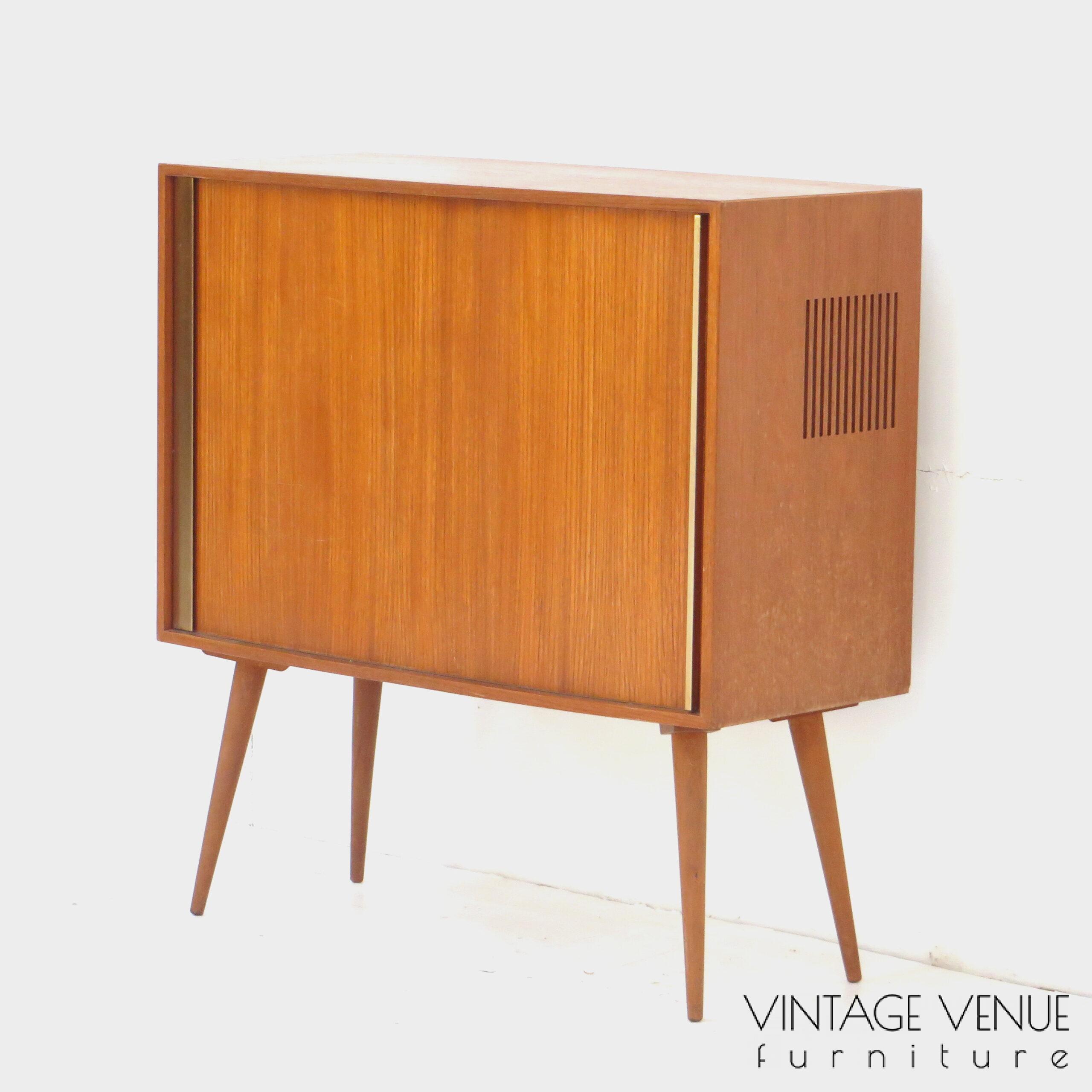 Vintage mid century modern small bookcase cabinet made of teak, 1960s / Vintage retro teak cabinet / sideboard cabinet / dresser cabinet / with roller door and sloping legs, 1950s '60s Vintage mid century modern small bookcase cabinet made of teak, 1960s / Vintage retro teak cabinet / sideboard cabinet / dresser cabinet / with roller door and sloping legs, 1950s '60s