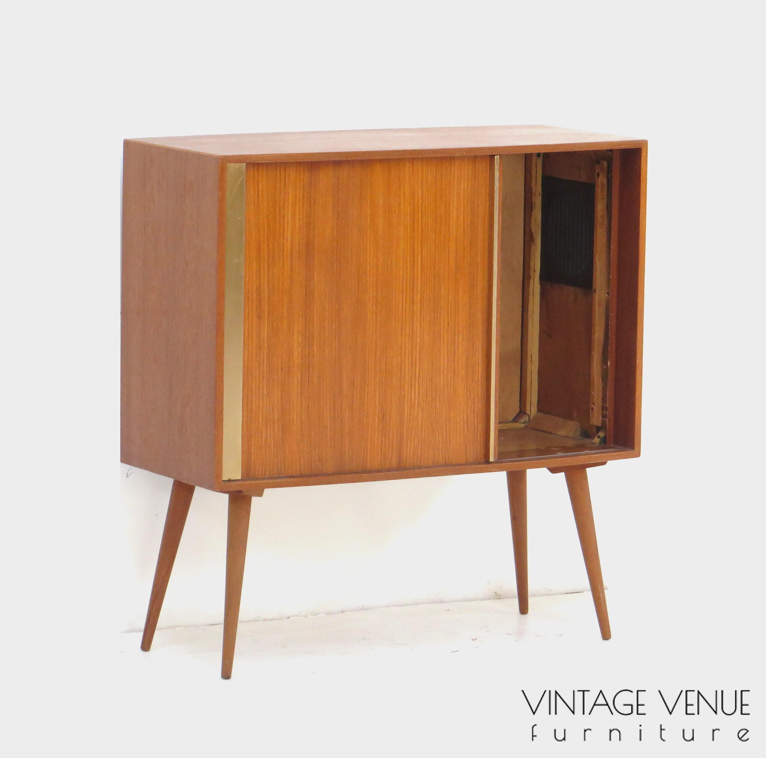 Vintage mid century modern small bookcase cabinet made of teak, 1960s / Vintage retro teak cabinet / sideboard cabinet / dresser cabinet / with roller door and sloping legs, 1950s '60s Vintage mid century modern small bookcase cabinet made of teak, 1960s / Vintage retro teak cabinet / sideboard cabinet / dresser cabinet / with roller door and sloping legs, 1950s '60s