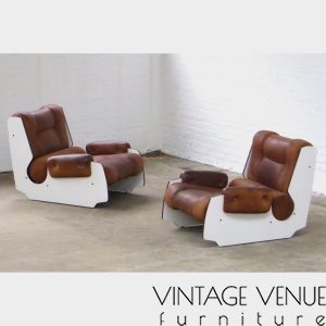 Frontside view of the unique set of two rare mid century modern leather lounge chairs