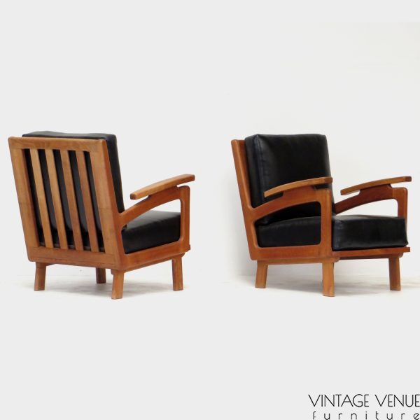Photo of the front and back of the two vintage lounge armchairs